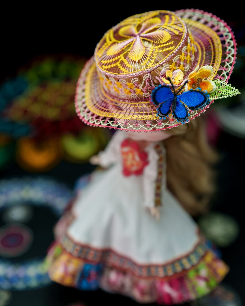 The hat seen from behind and above, its crown worked outward as a radiating rosette.